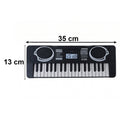 Size dimensions of the mini keyboard toy, perfect for children's hands