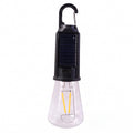 Portable solar camping lamp on white background