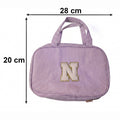 Size guide for travel toiletry organizer showing dimensions