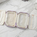 Hanging makeup organizer with stylish striped design