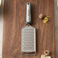 Steel grater ideal for vegetables, lemon zest, and spices