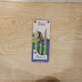 Hand cutting vegetables with a stainless steel kitchen knife