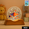 Close-up of glowing 3D creative visualization LED lamp on wooden base
