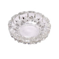 Versatile glass ashtray with multiple slots, suitable for both cigars and cigarettes.
