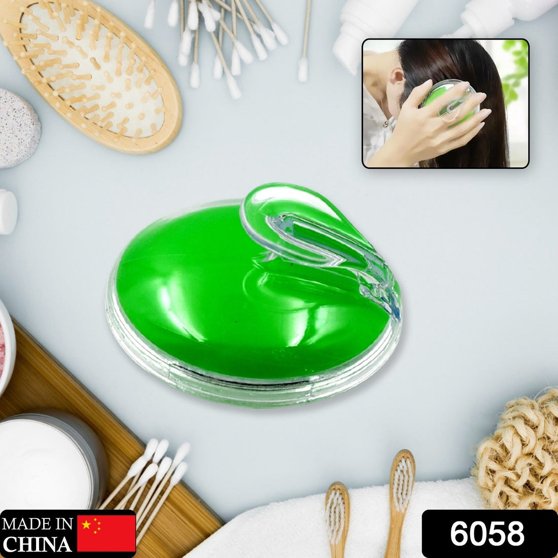 Silicone head massager with ergonomic handle for easy grip.