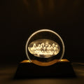 Clear crystal plate featuring 3D engraved running horses on LED table lamp