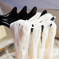 A diverse assortment of non-stick kitchen utensils for various cooking needs.