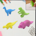 Four vibrant dinosaur erasers displayed together, ready for fun learning and play.