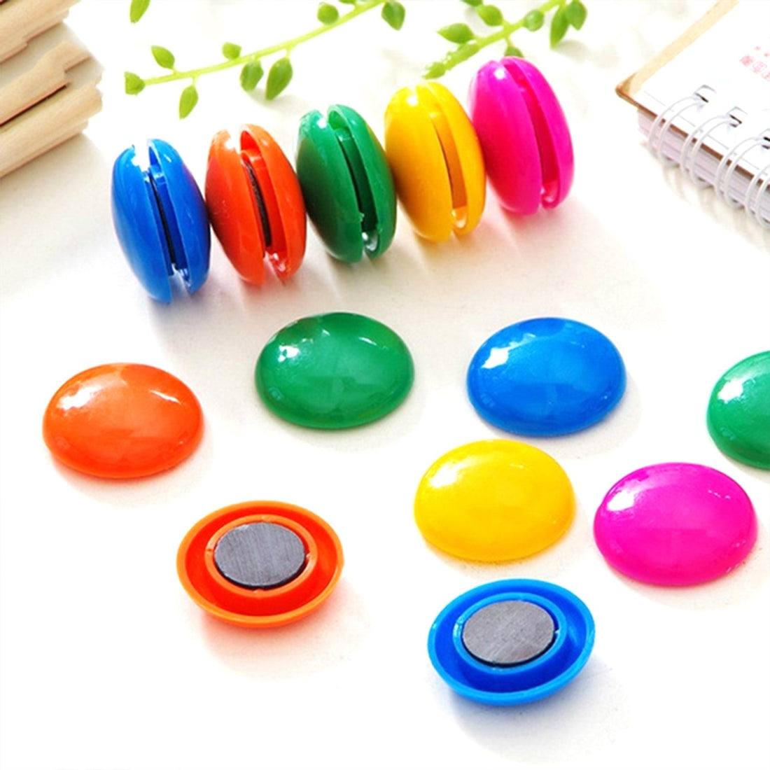 Set of 10 round magnetic buttons for kids' science experiments.