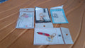 Collection of assorted acrylic and metal keychains