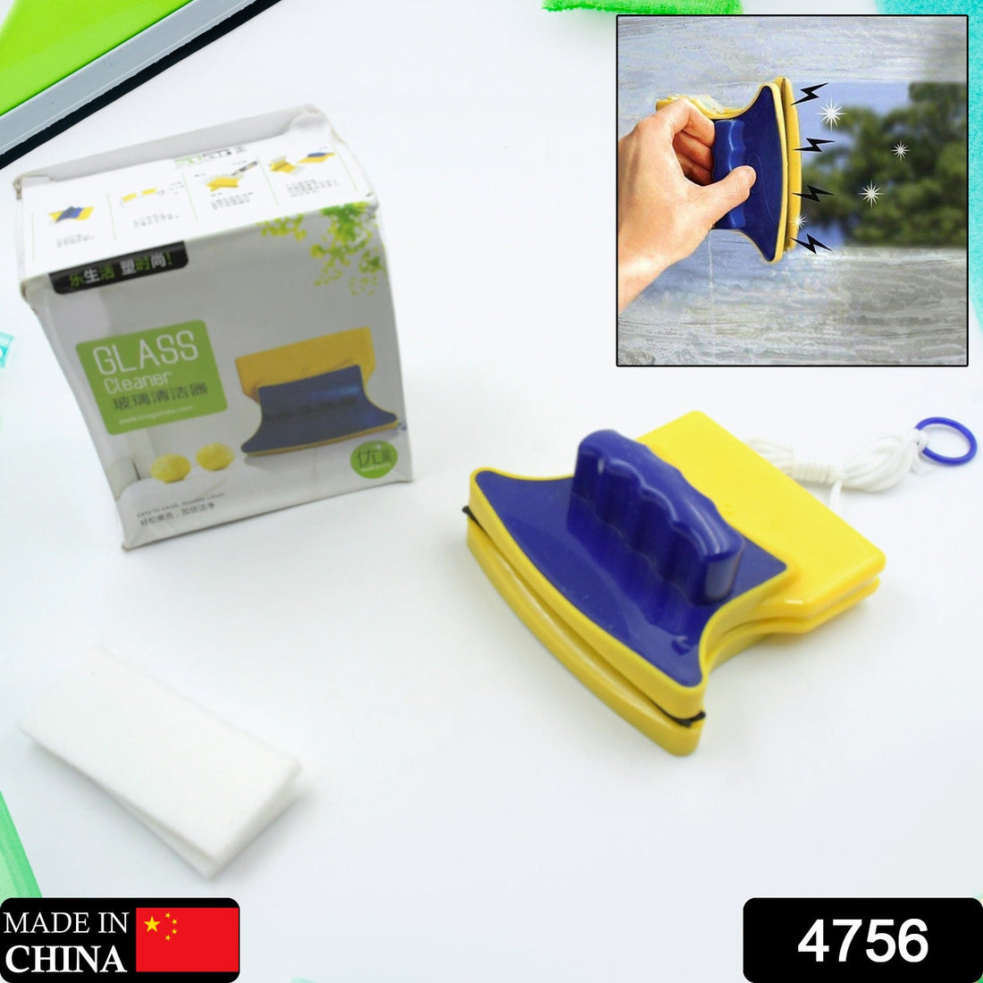 Front view of the magnetic window cleaner, showing its ergonomic handle and replaceable cleaning pads.