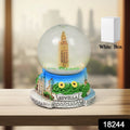 Close-up of the elegant snow globe design, highlighting its intricate details.