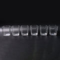 Side view of transparent diamond plastic glass set