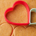 Plastic cookie cutters in various shapes, perfect for creative baking projects.
