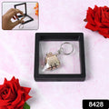 3D floating frame showcasing stylish nail clipper keychain accessory