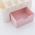 Close-up of the drawer in the multi-purpose cosmetic storage box, ready for small items.
