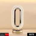 USB rechargeable crystal table lamp glowing with a warm light.