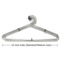 Elegant stainless steel hangers in a modern closet, perfect for keeping clothes wrinkle-free.