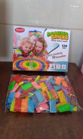 Neat stack of vibrant wooden domino blocks, ready for kids to play.
