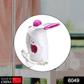 Compact and ergonomic handheld steamer, ideal for both garments and facial spa.
