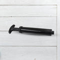 Close-up of the ball pump with both plastic and metal pins.