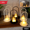Close-up of plastic flameless LED candle lamps with flickering glow