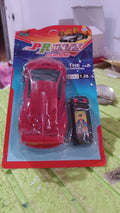 The remote control racing toy car speeding across an indoor surface, ideal for kids' fun.