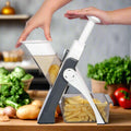 Efficient hand press chopper with built-in blades.