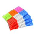 Close-up of sturdy plastic clothes clips designed for cloth drying.