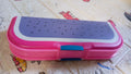 Top view of a cartoon printed pencil case with two organized compartments.