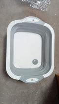 Dimensions of the foldable chopping board, illustrating its compact design.