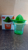 Hand holding Apex Manual Citrus Juicer for effortless fresh juice extraction