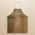 Kitchen apron worn during active cooking tasks