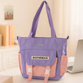 Versatile shoulder tote bag with adjustable strap in soft material