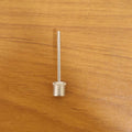 Ball pump needle adapter in use with sports ball pump