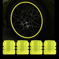 Set of four fluorescent green valve stem caps