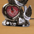 Romantic swan couple table lamp providing ambient bedroom lighting