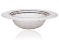 Stainless steel sink strainer seamlessly installed in a modern kitchen basin.