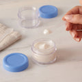 Mini refillable balm and cream jars for travel