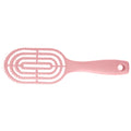 Men's hair brush held comfortably in hand, demonstrating easy grip.