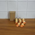 Mini Monk Buddha idol set arranged as peaceful decorative display