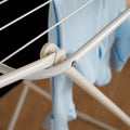 Sturdy foldable clothes drying rack with smooth rods for faster drying