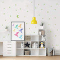 Fluorescent star and moon stickers glowing brightly at night, bringing the wonders of the cosmos indoors.