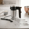 Multi speed hand mixer with stainless steel beaters for baking