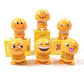 Collection of various smiling face spring toys, showcasing their playful design.