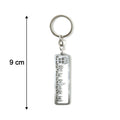 Close-up of Jay Sonal Ma devotional keychain in metallic finish