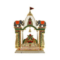 Religious jhula mandir for pooja adorned with elephant motifs