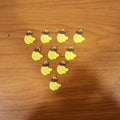 Assorted banana-shaped bag charms in set