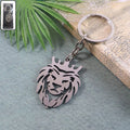 Front view of metal lion head keychain featuring a crowned lion design