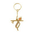 Keychain attached to keyring displaying detailed Krishna design with flute and peacock feather